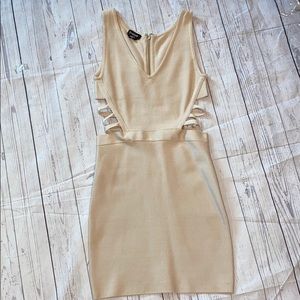 Bebe nude cut out bandage dress size M